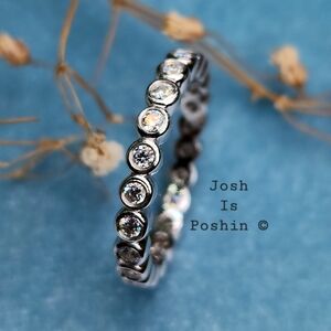 2MM full moissanite bezel set eternity band in sterling silver